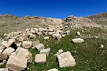 Non-inscribed stone blocks scattered around the Paikuli Tower of Narseh. Sulaymaniyah Governorate, Sulaymaniyah Museum