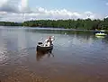 Water-based exercise activities such as open water swimming, canoeing, kayaking, rafting, and sailing.