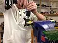 Andrew drills a hole in the new gimbal joint.